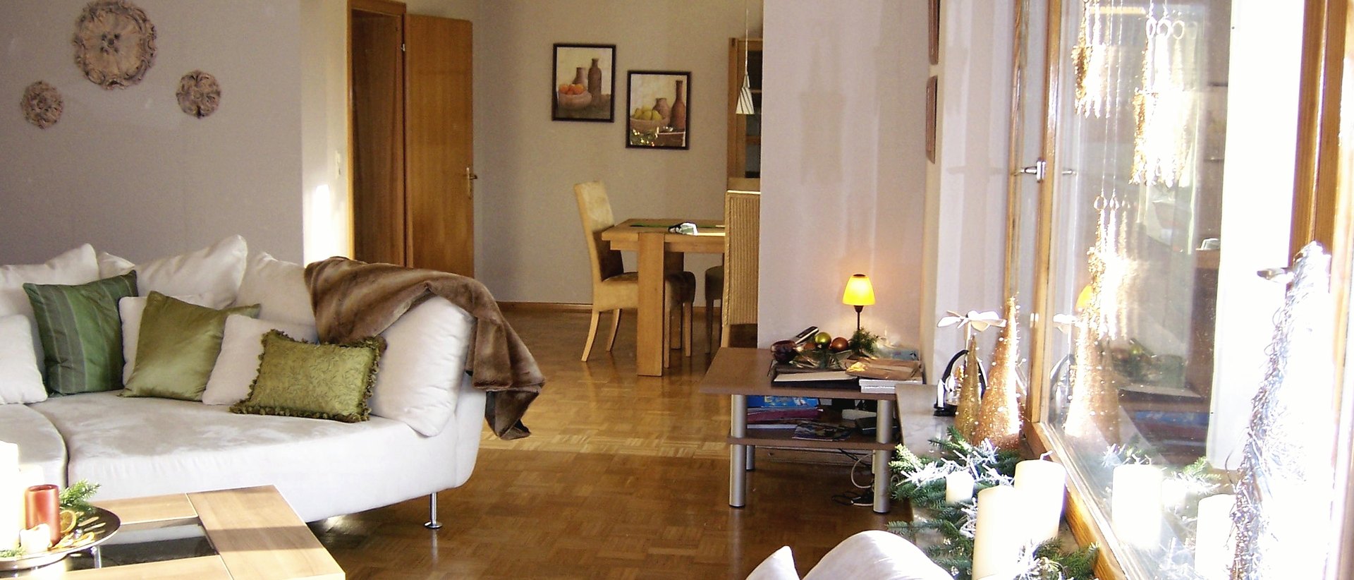 Warm living room with oak furniture and afternoon light