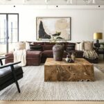 Oak coffee table with visible grain standing in a sitting room