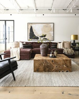 Oak coffee table with visible grain standing in a sitting room