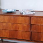 Oak sideboard with four doors in a dining room