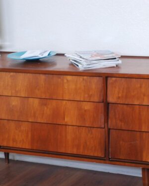 Oak sideboard with four doors in a dining room