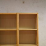 Ash shelving unit with books and boxes