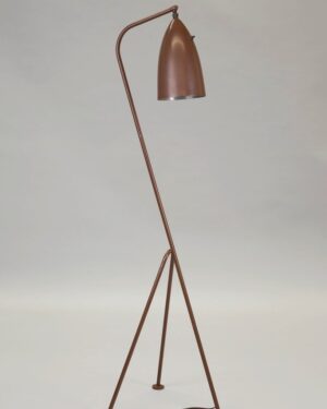Paper floor lamp with oak base beside a chair